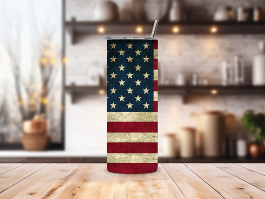 20oz stainless steel tumbler with a vintage American Flag design, perfectly sized for Starbucks Venti drinks. Features double-wall insulation to keep beverages hot for up to 6 hours and cold for up to 12 hours. Includes a spill-resistant lid and straw, ideal for travel. Eco-friendly, reusable, and easy to clean. Actual product color may vary from the images shown.