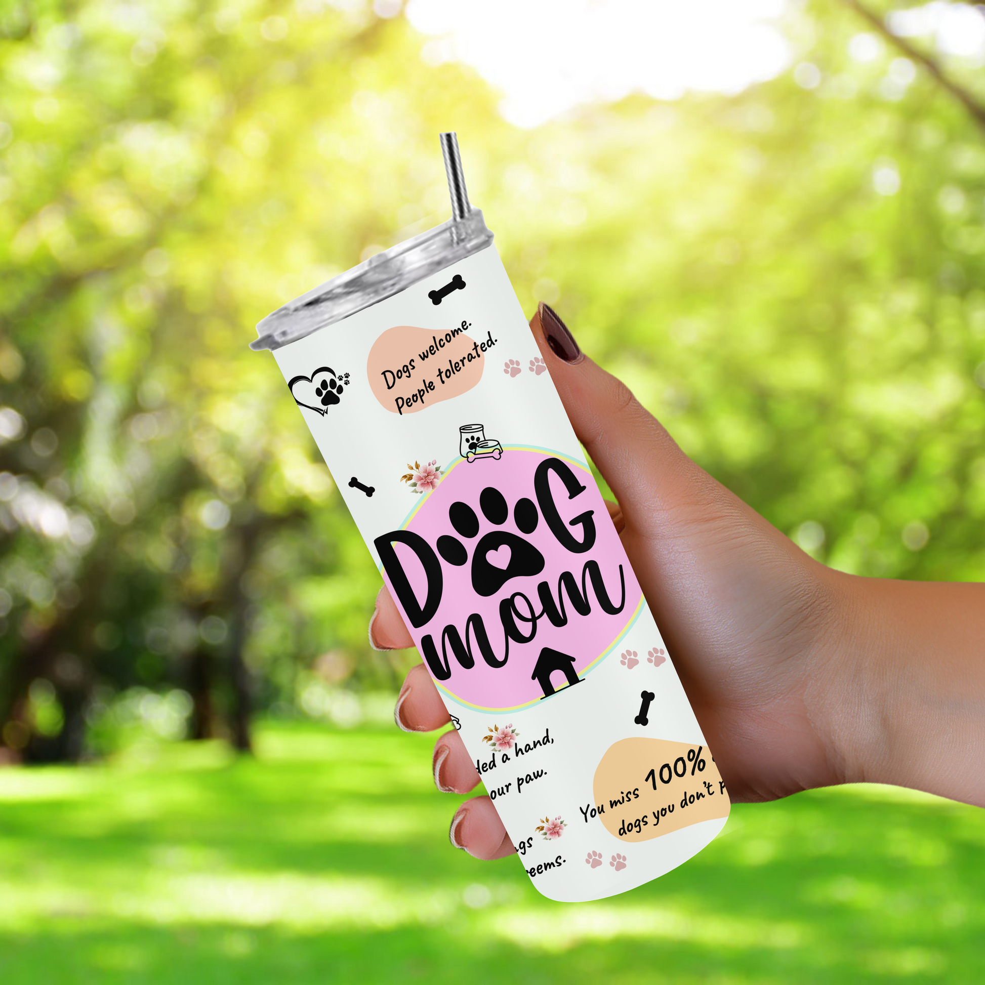 20oz stainless steel tumbler with a cute ‘Dog Mom’ design, sized for Starbucks Venti drinks. Features playful dog-themed quotes and paw prints with double-wall insulation to keep beverages hot for up to 6 hours and cold for up to 12 hours. Comes with a spill-resistant lid and straw. Eco-friendly and reusable. Actual product color may vary from the images shown.