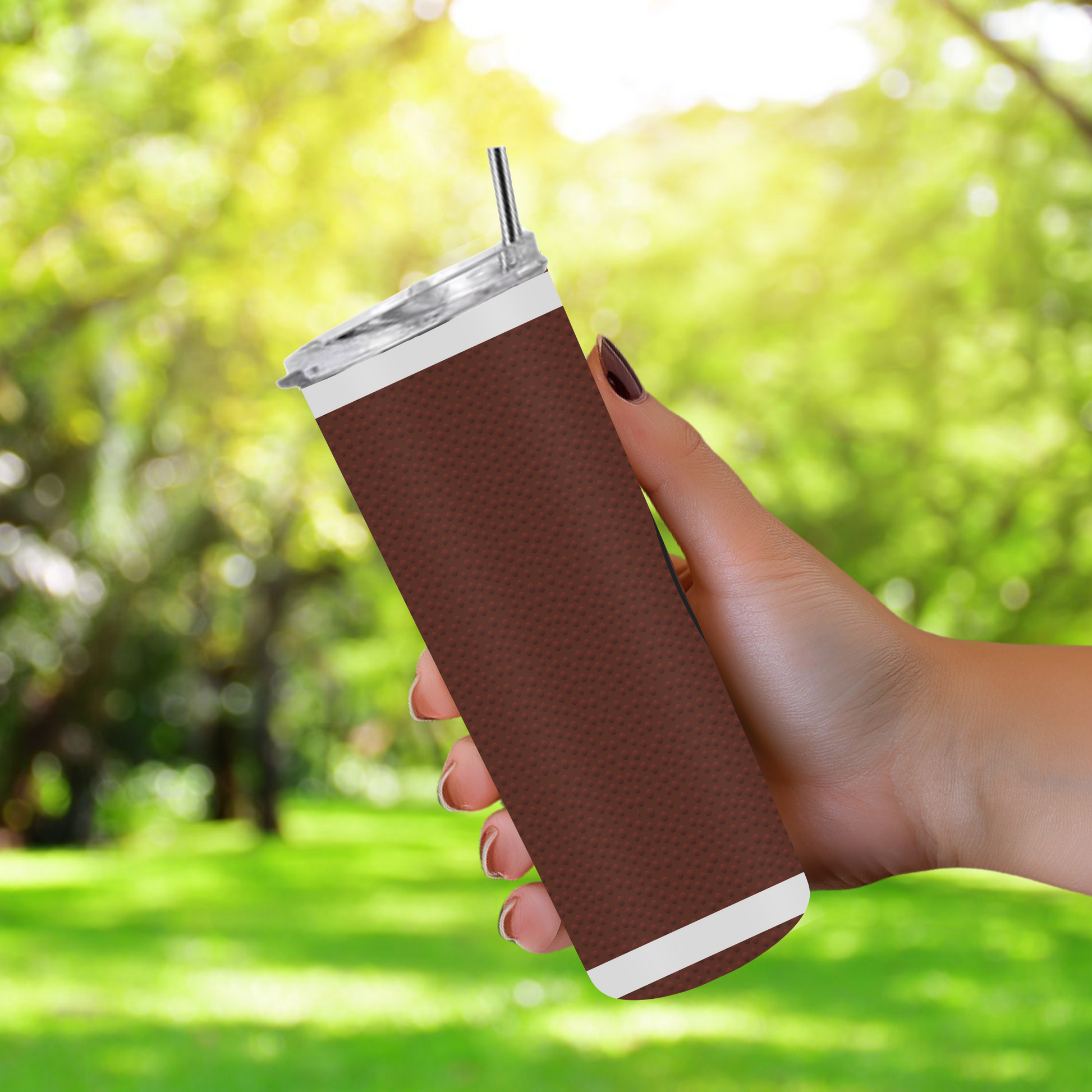 20oz stainless steel tumbler with a classic football design, sized for Starbucks Venti drinks. Features double-wall insulation to keep beverages hot for up to 6 hours and cold for up to 12 hours. Includes a spill-resistant lid and straw, perfect for eco-friendly, reusable use. Actual product color may vary from the images shown.