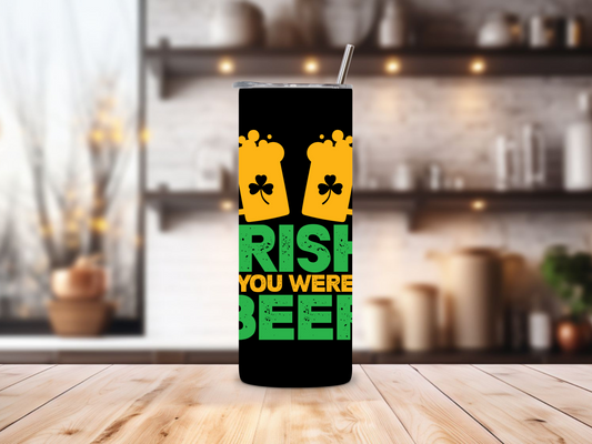 20oz stainless steel tumbler featuring the ‘Irish You Were Beer’ design with beer mugs and shamrocks. Sized for Starbucks Venti drinks, it offers double-wall insulation to keep beverages hot for up to 6 hours and cold for up to 12 hours. Includes a spill-resistant lid and straw. Eco-friendly and reusable. Actual product color may vary from the images shown.