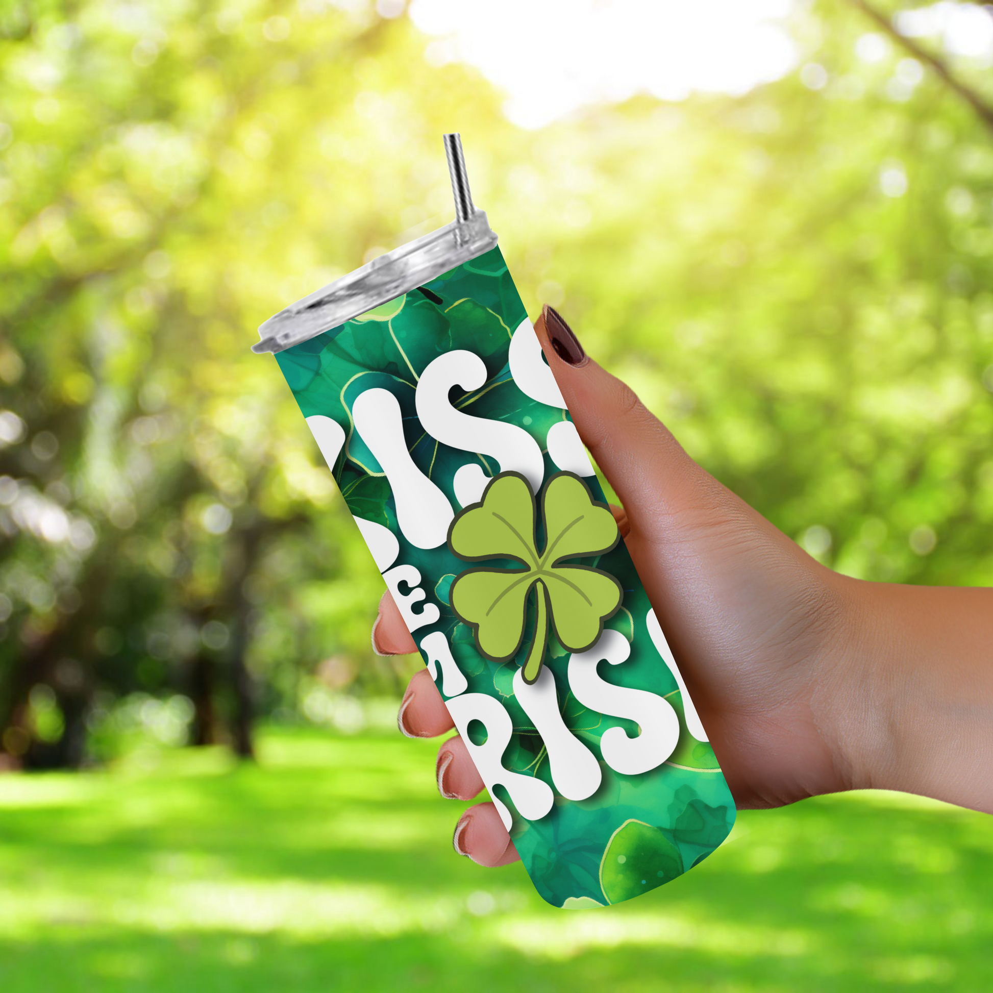 20oz stainless steel tumbler featuring a vibrant ‘Kiss Me I’m Irish’ design with shamrocks. Sized for Starbucks Venti drinks, it offers double-wall insulation to keep beverages hot for up to 6 hours and cold for up to 12 hours. Includes a spill-resistant lid and straw. Eco-friendly and reusable. Actual product color may vary from the images shown.