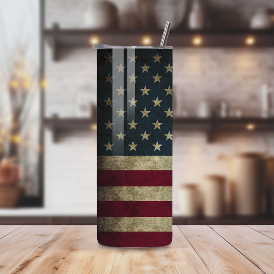 20oz stainless steel tumbler with a vintage American Flag design, perfectly sized for Starbucks Venti drinks. Features double-wall insulation to keep beverages hot for up to 6 hours and cold for up to 12 hours. Includes a spill-resistant lid and straw, ideal for travel. Eco-friendly, reusable, and easy to clean. Actual product color may vary from the images shown.