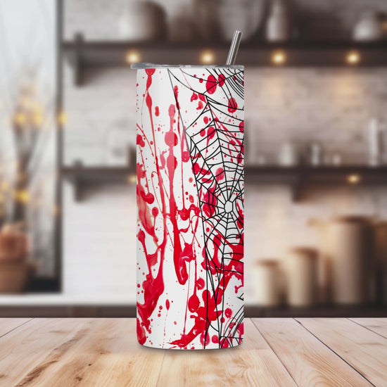 20oz stainless steel tumbler featuring a bold ‘Spooky Bitch Season’ design with blood splatters, spider webs, and Halloween-themed accents. Perfectly sized for Starbucks Venti drinks, it offers double-wall insulation to keep beverages hot for up to 6 hours and cold for up to 12 hours. Comes with a spill-resistant lid and straw. Eco-friendly and reusable. Actual product color may vary from the images shown.