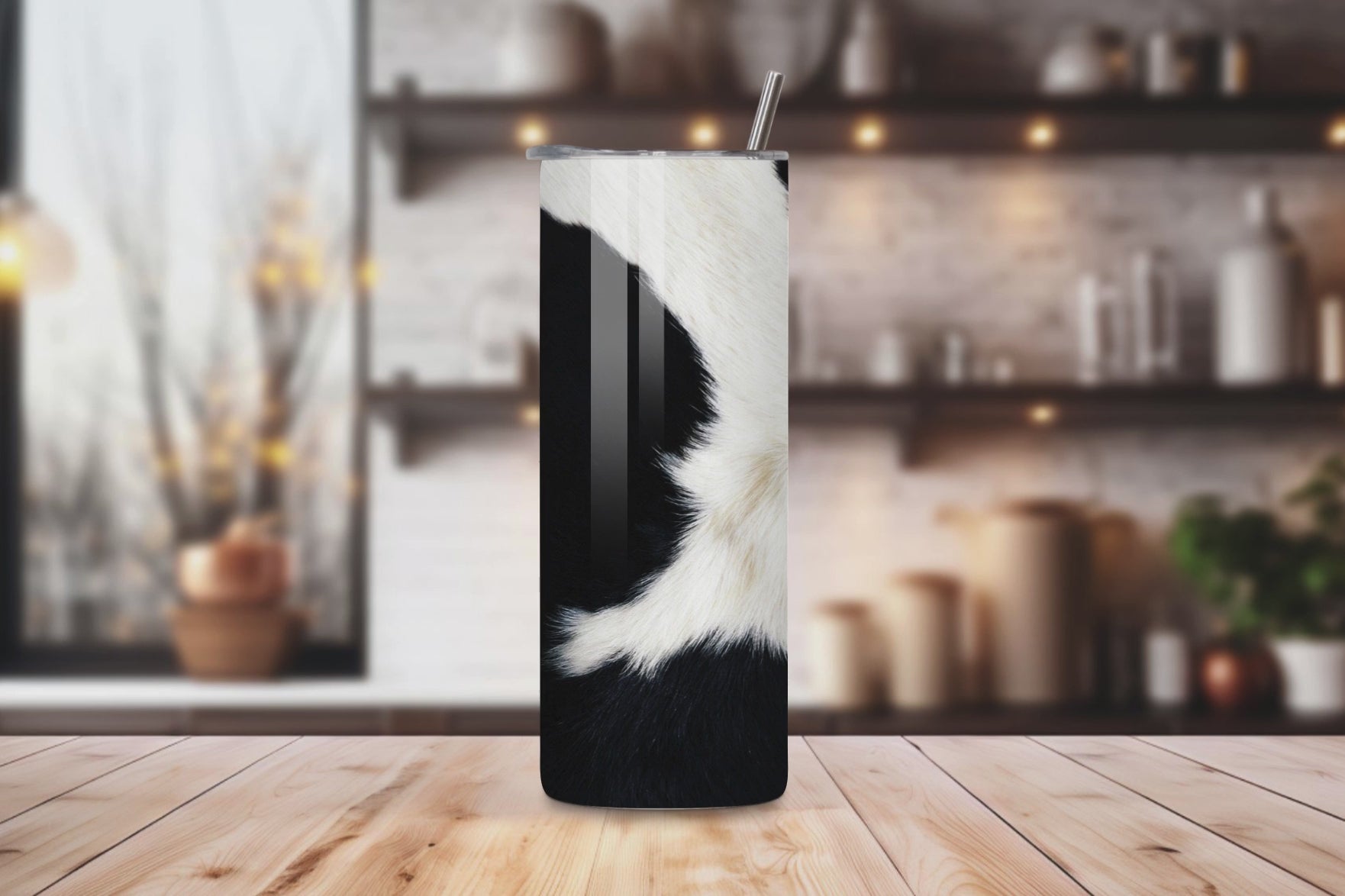20oz stainless steel tumbler with a trendy black-and-white cow print, sized for Starbucks Venti drinks. Features double-wall insulation to keep beverages hot for up to 6 hours and cold for up to 12 hours. Comes with a spill-resistant lid and straw, perfect for eco-friendly, reusable travel. Actual product color may vary from the images shown.