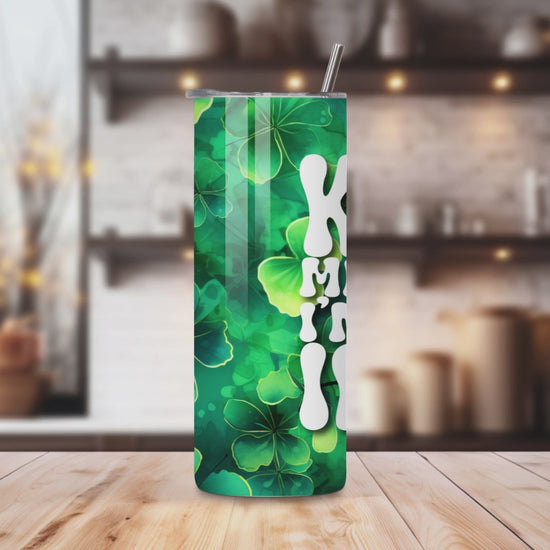 20oz stainless steel tumbler featuring a vibrant ‘Kiss Me I’m Irish’ design with shamrocks. Sized for Starbucks Venti drinks, it offers double-wall insulation to keep beverages hot for up to 6 hours and cold for up to 12 hours. Includes a spill-resistant lid and straw. Eco-friendly and reusable. Actual product color may vary from the images shown.