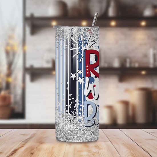 20oz stainless steel tumbler featuring a fun ‘Red White Boozed’ design with patriotic red, white, and blue colors, fireworks, and wine glass accents. Sized for Starbucks Venti drinks, it offers double-wall insulation to keep beverages hot for up to 6 hours and cold for up to 12 hours. Includes a spill-resistant lid and straw. Eco-friendly and reusable. Actual product color may vary from the images shown.​